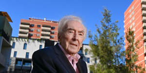97-year-old architect Peter McIntyre at the Carlton public housing flats he helped design in the 1960s.
