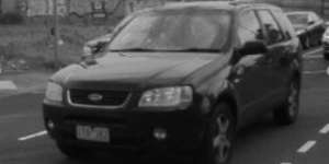 Police are looking for this black Ford Territory wagon.