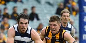 Hawks fans let favourite son,and now Geelong player Isaac Smith have it during the game.