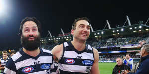 Jimmy Bartel and Corey Enright - inseparable as Cats teammates,and members of the Australian Football Hall of Fame.