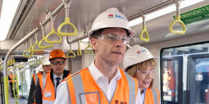 Premier Chris Minns and Transport Minister Jo Haylen board a new metro train which is undergoing testing on the main section of the City and Southwest line.