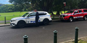 Police search for evidence after a man fired a replica firearm behind NSW Parliament House.