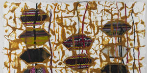 Maria Madeira’s Kiss and Don’t Tell (detail),2024,Tais (traditional East Timorese cloth),red earth.