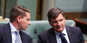 Andrew Hastie and Angus Taylor in the House of Representatives on Tuesday. 