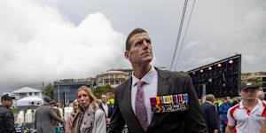 Ben Roberts-Smith and his partner Sarah Matulin attending a dawn service in Currumbin,Queensland,last month. 