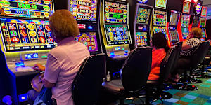 Patrons gamble on the poker machines at Bankstown Sports Club.