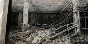 Part of the interior of the ground floor of a building which was gutted by fire on August 31.