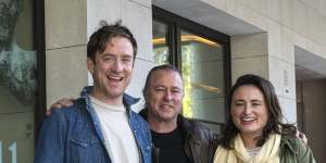 Mike and Mia Russell with Neil Perry (centre) outside their Sydney bakery.