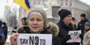 Activists hold posters during a SayNOtoPutin rally in Kiev,Ukraine,on January 9,2022.