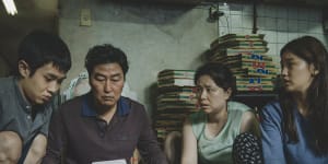 The Kims,a poor family of hustlers,determined to fake it until they make it,in Parasite.