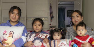 The Zhang sisters Yueying,Boran,Xinyu and Xinran with their mother,Xu Zhenzhen. “I’ve already told my children,‘Don’t follow in your mum’s footsteps,’ ” says Xu.