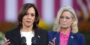 Democratic presidential nominee Vice President Kamala Harris speaks with former representative Liz Cheney,at a campaign rally in Wisconsin.