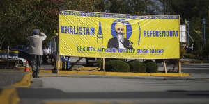 A photograph of late temple president Hardeep Singh Nijjar is seen on a banner outside the Guru Nanak Sikh Gurdwara Sahib in Surrey,British Columbia.