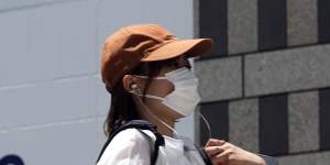 Tokyo coronavirus cases surge ahead of opening ceremony
