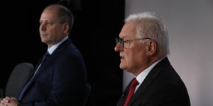 Westpac chairman John McFarlane (right) said the bank would work on its executive pay structure after incurring a first strike.