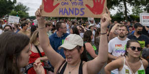 Crowds outside the US Supreme Court in Washington on Friday.