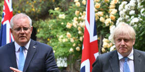 Prime ministers Scott Morrison and Boris Johnson at their joint press conference in the Downing Street garden.
