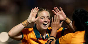 YORK,ENGLAND - AUGUST 30:Caitlyn Halse of Australia celebrates with teammate Cecilia Smith after scoring her team’s fourth try during the Women’s Rugby World Cup 2025 Pool A match between USA and Australia at the York Community Stadium on August 30,2025 in York,England. (Photo by Stu Forster/Getty Images)