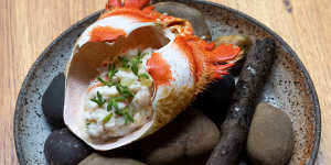 Spanner crab mixed with pickled apple and creme fraiche and scooped back into the upturned shell.