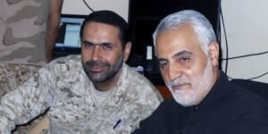 Wissam al-Tawil pictured sitting next to slain Iran’s Quds force General Qassem Soleimani,who was killed in Baghdad by a US. drone strike in January 2020.
