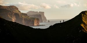 Created by volcanic eruptions about 55 million years ago,and subsequently eroded by glaciers,winds and waves,this dreamlike archipelago sprouts almost halfway between Iceland and Britain.