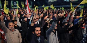 Supporters of the Lebanese Shiite party Hezbollah cheer as they listen to a speech by their leader Hassan Nasrallah in Beirut in February.