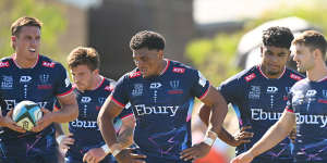 Rebels players prepare for a scrum during the Super Rugby Pacific Trial Match between Melbourne Rebels and NSW Waratahs.