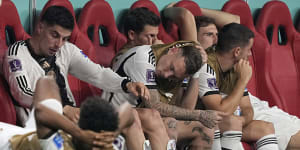 Germany’s bench reacts to their World Cup exit.