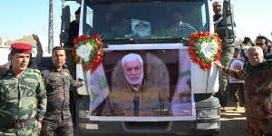 Mourners take part in a funeral procession for al-Muhandis in Basra,Iraq.