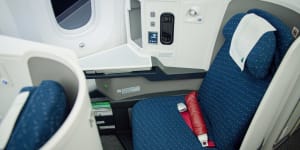 Seated,there is acres of leg room in business class.