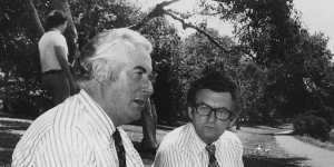 Gough Whitlam and Bob Hawke relax on the banks of the Yarra River after a rally in City Square in 1972.