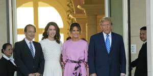 Billionaire John Paulson and fiancee Alina de Almeida with Melania and Donald Trump at a fundraiser in April.