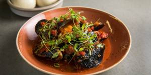 Mussels with house made chilli sauce and steamed bau (buns)