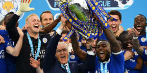 Foxes celebration:Captain Wes Morgan and manager Claudio Ranieri lift the Premier League Trophy.