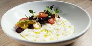 Stracciatella with tomatoes and beetroot at Kindred in Darlinghurst.