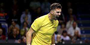 Thanasi Kokkinakis of Team Australia celebrates a point in his singles match against Ben Shelton of Team USA.