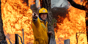 Firefighters defend homes in Pyrenees bushland GIF.