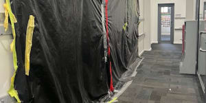 Plastic covering black mould in a classroom at Fitzroy North Primary School.