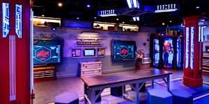 The kids’ club has several themed areas,including a Marvel section.