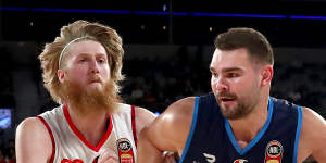 Melbourne United’s Isaac Humphries (right) has become the first openly gay man in the NBL.