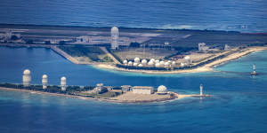 An airfield,buildings,and structures are seen on the artificial island built by China in Fiery Cross Reef on October 25,2022 in Spratly Islands,South China Sea.