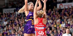 Gretel Bueta of the Firebirds in action against the NSW Swifts in round one.
