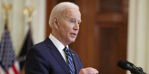 US President Joe Biden speaks during a news conference in the East Room of the White House in Washington,DC.