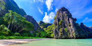 Hidden Beach,El Nido,The Philippines. A four-kilometre stretch of bone-white sand surrounded by limestone cliffs only reachable via a hole in the rocks.