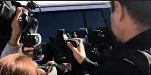 Media surround the van holding serial killer Ivan Milat. 