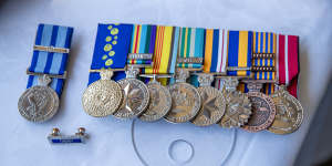 James’s RAN service medals and NSW Police medal.