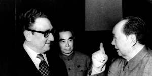 Henry Kissinger meets with Communist China’s chairman Mao Tse-tung (right) and premier Zhou Enlai in 1973,after secretly re-establishing relations two years earlier.