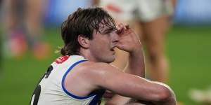 Lionhearted North Melbourne youngster George Wardlaw reacts to his team’s loss to Collingwood.