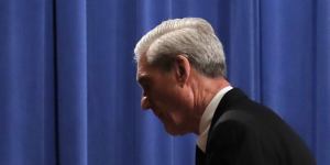 Job done:Special Counsel Robert Muller walks from the podium after speaking at the US Department of Justice on Wednesday.