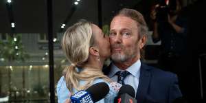 Craig McLachlan is kissed by his partner,Vanessa Scammell,after the verdicts.